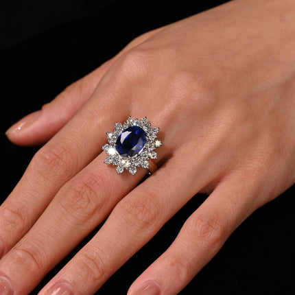 GRS Certified 5.79 Carat Oval Royal Blue Sapphire and Diamond Halo Ring