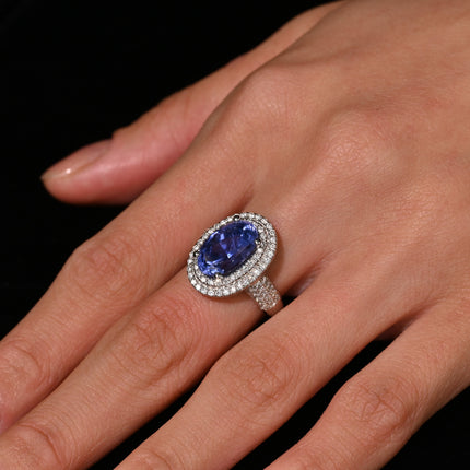 6.34 Carat No Heat Oval Cut Blue Sapphire and Diamond Halo 18K Ring GRS Certified