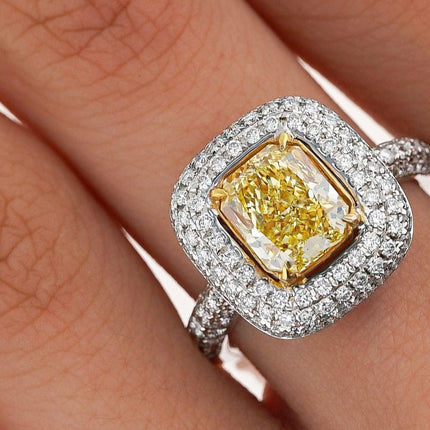 GIA Certified 2.35 Fancy Yellow Diamond Ring With 1.0 CTW Diamond Cluster in 18K White Gold