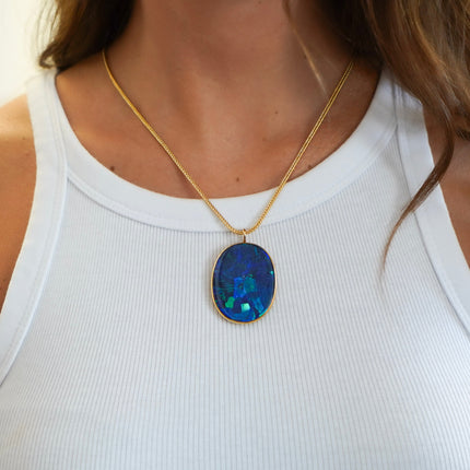 GIA Certified 35 Carat Marcus & Co Australian Black Opal in 18K Gold Pendant
