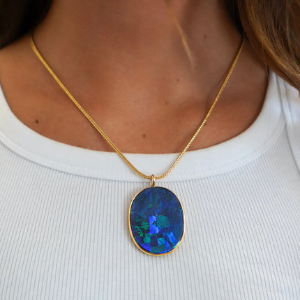 GIA Certified 35 Carat Marcus & Co Australian Black Opal in 18K Gold Pendant