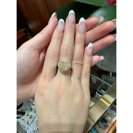 GIA Certified 5.03 Carat Fancy Yellow Heart-Shaped Diamond & Halo 18K Gold Ring