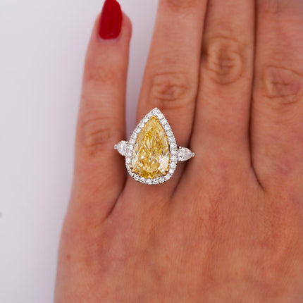 GIA Certified 6.06 Carat Fancy Intense Yellow Pear Cut Diamond 18K Ring