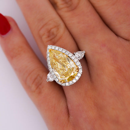 GIA Certified 6.06 Carat Fancy Intense Yellow Pear Cut Diamond 18K Ring
